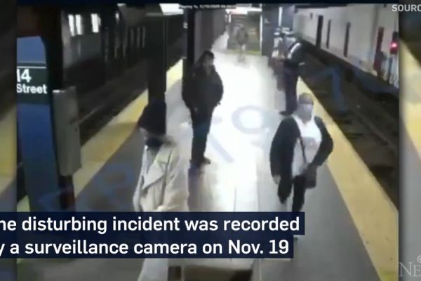 Woman survives being pushed in front of NYC subway train