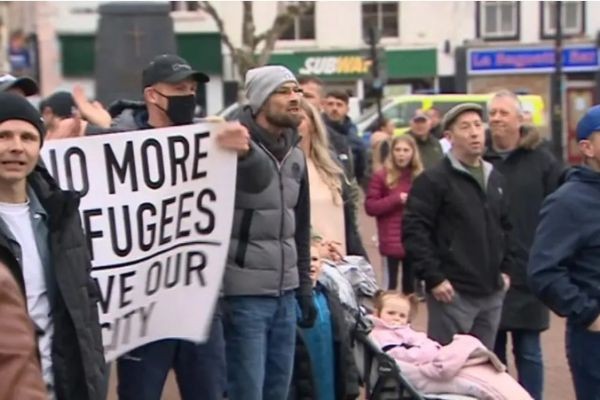 Mass demo at 'migrant barracks' as Home Secretary warns illegal crossings 'TEARING COUNTRY APART'